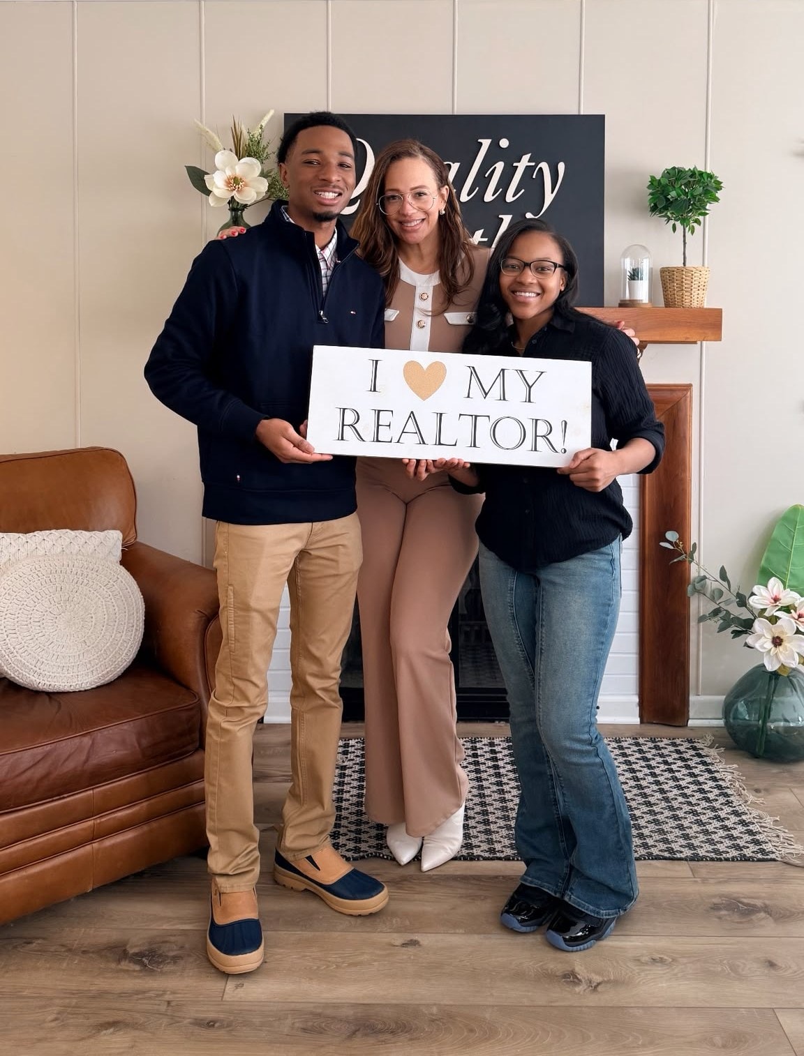 Carmello Mitchell celebrating homeownership with his REALTOR